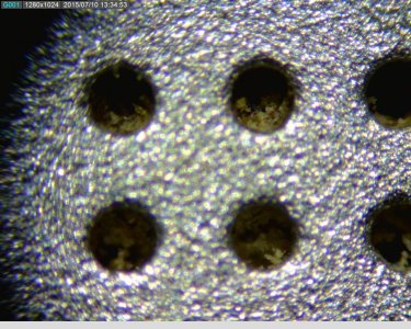 Gross HTC One speaker grille.jpg