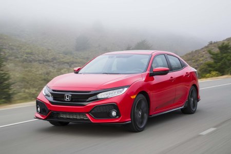 2017-Honda-Civic-Hatchback-Sport-Touring-front-three-quarter-in-motion-02.jpg