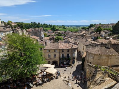 PXL_20220531_132832860 -- View looking southeast across a village square towards the surrounding.jpg