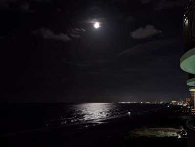 PXL_20220807_035016984 -- View along Crescent Beach at night under a nearly-full moon, looking s.jpg