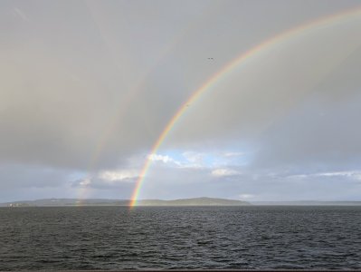 PXL_20250503_175627168 -- A double rainbow off the southwest coast of Jeloya Island, looking e...jpg