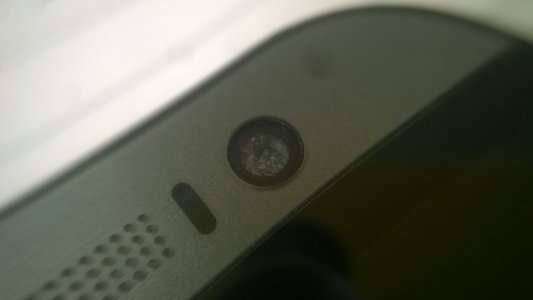 dusty front facing lens HTC One M8.jpg